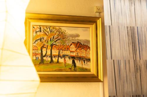 a picture of a painting on a wall at Kyotoya in Takeo