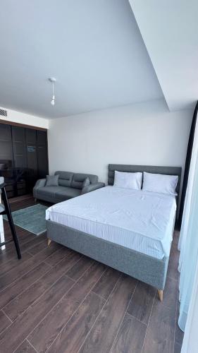 Ένα ή περισσότερα κρεβάτια σε δωμάτιο στο Grand Sapphire Luxury Residence