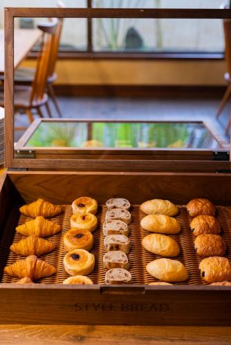 a display case of various types of donuts and pastries at Kyotoya in Takeo