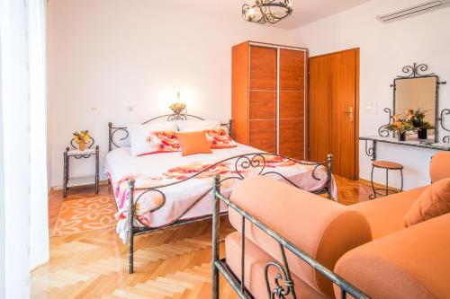 Postelja oz. postelje v sobi nastanitve Guesthouse Villa Maria