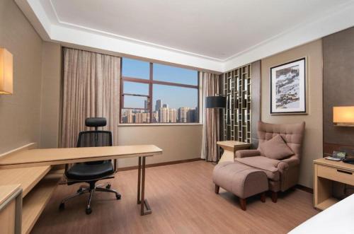 Posezení v ubytování Echeng Hotel Wuhan Optics Valley Square Yangjiawan Metro Station