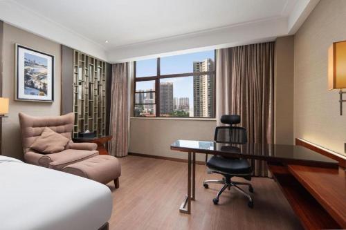 Posezení v ubytování Echeng Hotel Wuhan Optics Valley Square Yangjiawan Metro Station