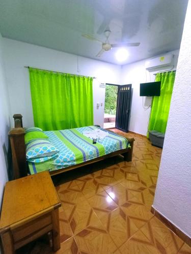 Postel nebo postele na pokoji v ubytování Hotel Campestre la Meseta