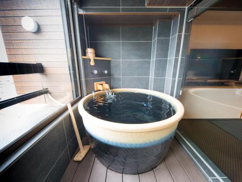 Koupelna v ubytování LiVEMAX RESORT Aki Miyajima