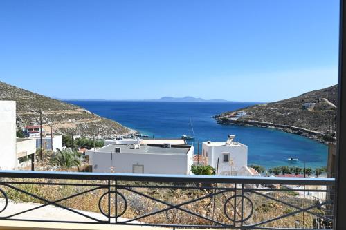 a view of the ocean from a balcony at Julie's SeaView Apartment in Vlychádia