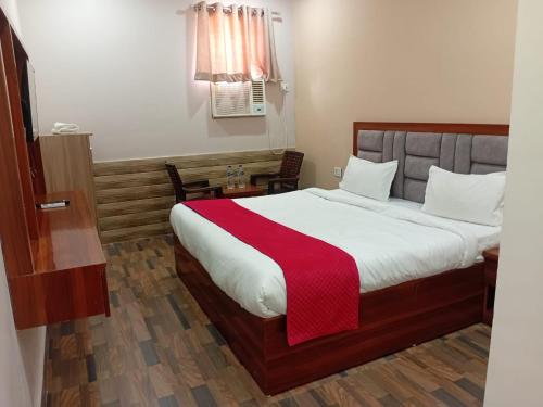 Postel nebo postele na pokoji v ubytování Padharo Sa Bikaner Wale