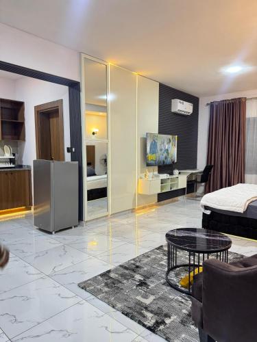 Postel nebo postele na pokoji v ubytování Cozy Studio in GRA - Portharcourt