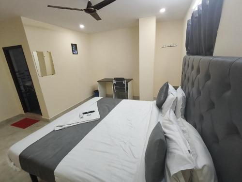 Voodi või voodid majutusasutuse Hotel Shri Biraj Residency toas