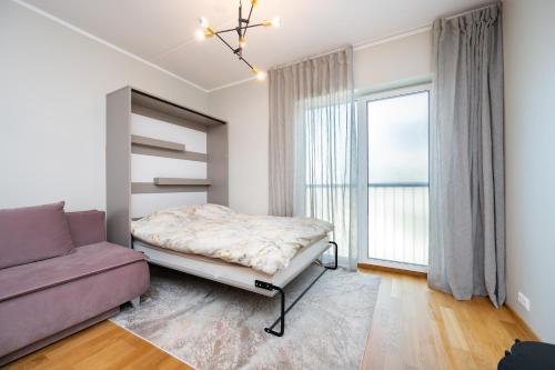 Postel nebo postele na pokoji v ubytování Simple Stay at Katusepapi