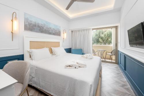 Postel nebo postele na pokoji v ubytování Corfu Mare Hotel -Adults only