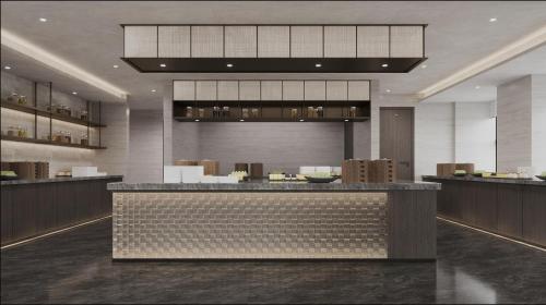 a lobby with a bar in a building at Atour Hotel Chongqing Grand Hall Jialing River Riverside Road in Chongqing