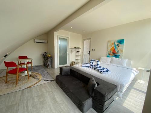 Χώρος καθιστικού στο Narayana Hotel Karimunjawa