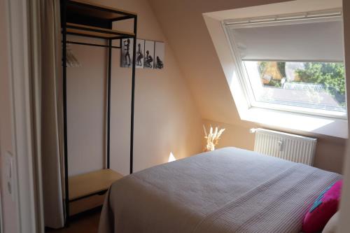 Ένα ή περισσότερα κρεβάτια σε δωμάτιο στο Sinfonia