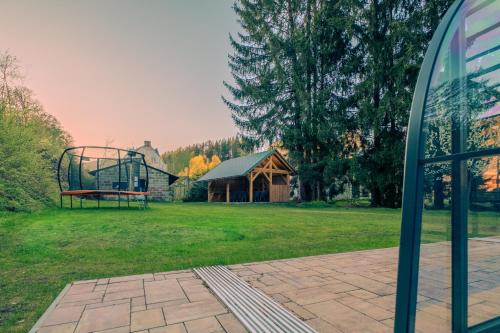 a view of a park with a playground at Villa with a covered pool, park, and playground in Svoboda nad Úpou