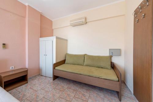 a room with a bed in a room at Alex bar apartments in Sarakiniko