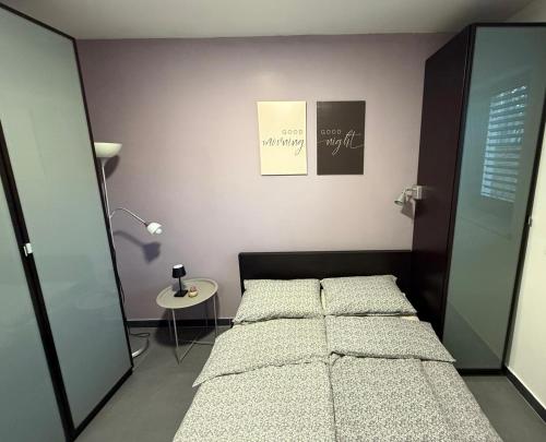 Postel nebo postele na pokoji v ubytování Apartma Lavanda Portorož