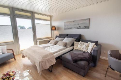 Χώρος καθιστικού στο 59 Ferienwohnung Südstrandglück App.68-004