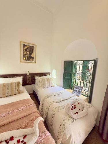 Llit o llits en una habitació de Riad Al Karama