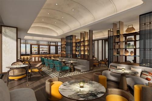 a rendering of a restaurant with tables and chairs at Vinpearl Hotel Bắc Ninh in Bắc Ninh