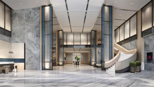 a rendering of a lobby with a staircase at Vinpearl Hotel Bắc Ninh in Bắc Ninh