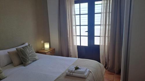 Postel nebo postele na pokoji v ubytování Marina azul