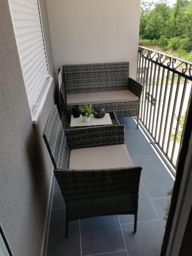Un balcón o terraza en Apartman Goga 2