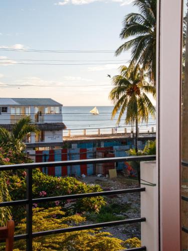 a view of the beach from a balcony at Boracay Beach Club in Boracay