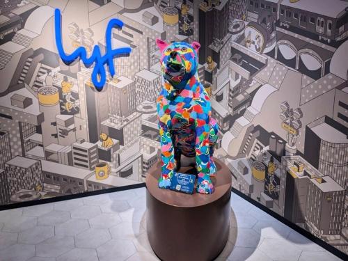 a statue of a dog on a table in a city at lyf Shibuya Tokyo in Tokyo