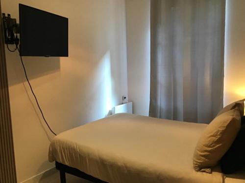 Μια τηλεόραση ή/και κέντρο ψυχαγωγίας στο Chambre Cosy 2
