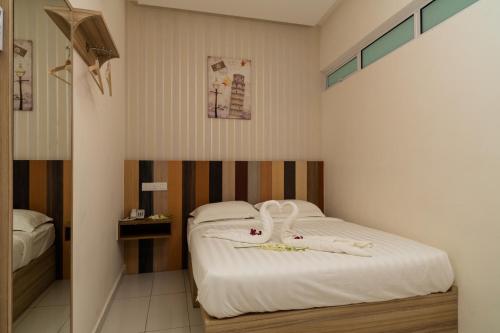 Cama ou camas em um quarto em Uptown Subang Airport