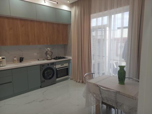 Una cocina o zona de cocina en Cozy Family Villa