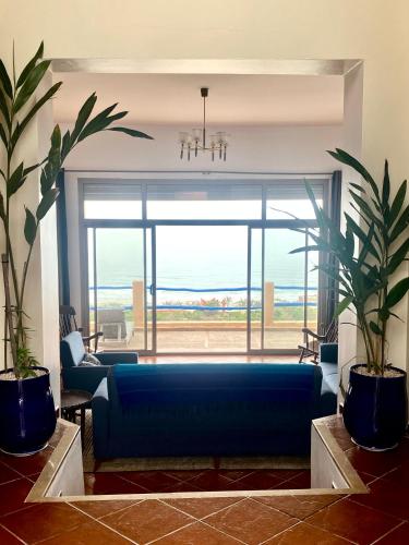 Χώρος καθιστικού στο Grande villa vue sur la mer