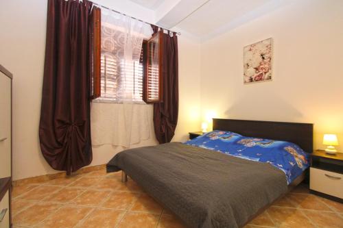 Posteľ alebo postele v izbe v ubytovaní Apartments Sandra 1335