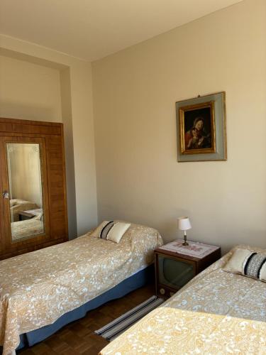 Кровать или кровати в номере BASISA Bed&Breakfast