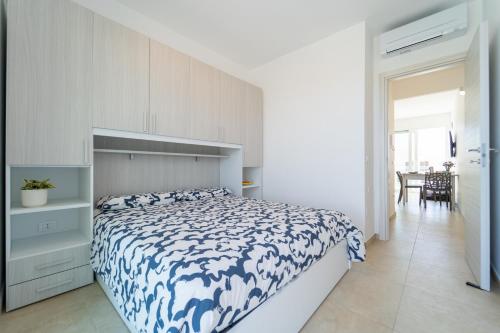 En eller flere senge i et værelse på GuestHost - Borgo 84 Marzamemi - Interno 23