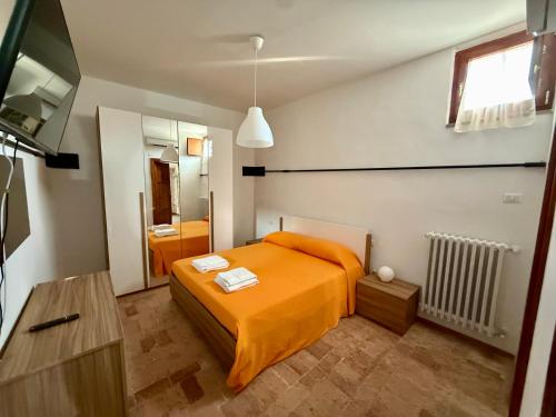 Postel nebo postele na pokoji v ubytování A Casa di Laura