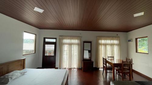 Ένα ή περισσότερα κρεβάτια σε δωμάτιο στο A & P HomeStay