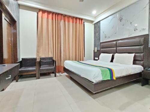 Cama ou camas em um quarto em Dee Intercontinental