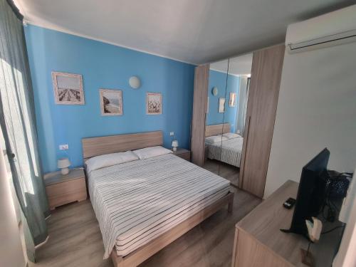 Postel nebo postele na pokoji v ubytování Residence Serenella - Dependance