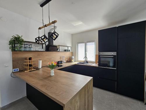 Kuchyň nebo kuchyňský kout v ubytování Apartman Ivan