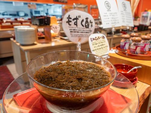 a bowl of food on a table in a store at Hotel Art Stay Naha Kokusai-Dori in Naha