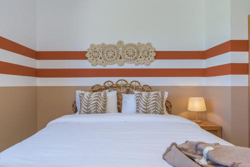 Postel nebo postele na pokoji v ubytování Glow - Stylish Apartments & Rooftops in Batroun