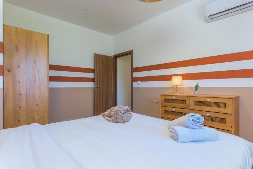 Postel nebo postele na pokoji v ubytování Glow - Stylish Apartments & Rooftops in Batroun