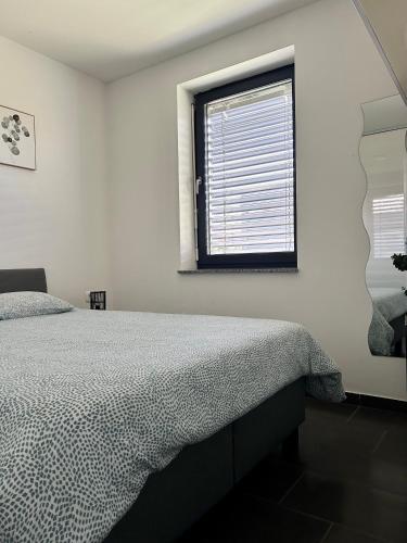 Postel nebo postele na pokoji v ubytování AURORA Apartment Banovci