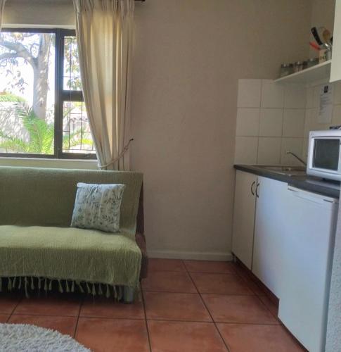 Kuchyň nebo kuchyňský kout v ubytování N-One Self Catering