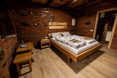 Ein Bett oder Betten in einem Zimmer der Unterkunft Etno Camp Lucić