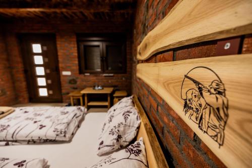 Ein Bett oder Betten in einem Zimmer der Unterkunft Etno Camp Lucić