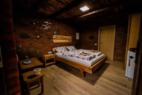 Ein Bett oder Betten in einem Zimmer der Unterkunft Etno Camp Lucić