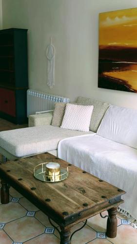 a living room with a couch and a coffee table at Apartment Wexford Crescent Mall in Wexford