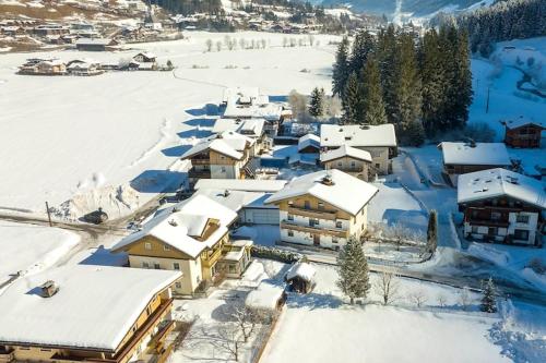 an aerial view of a village covered in snow at Apartment in Wald near Krimml Waterfalls in Wald im Pinzgau